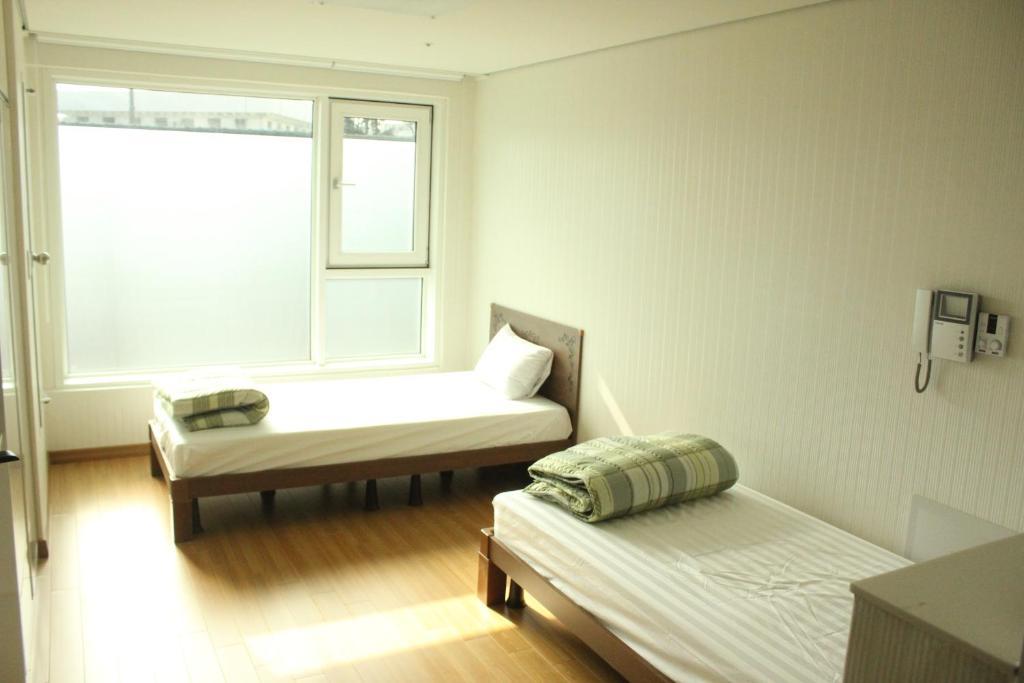 A Pousada Phil House Guri Quarto foto